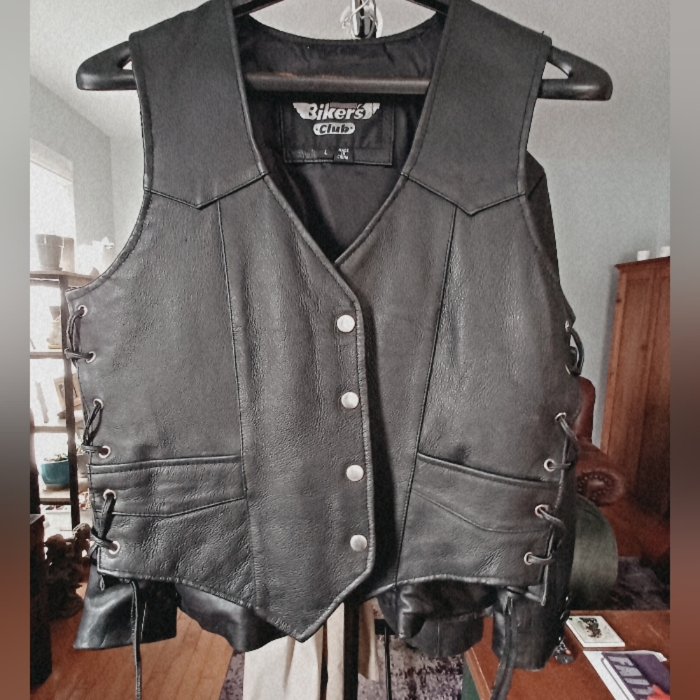 Black Leather biker vest. Lots of details
